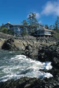 Wickaninnish Inn with waves crashing on beach